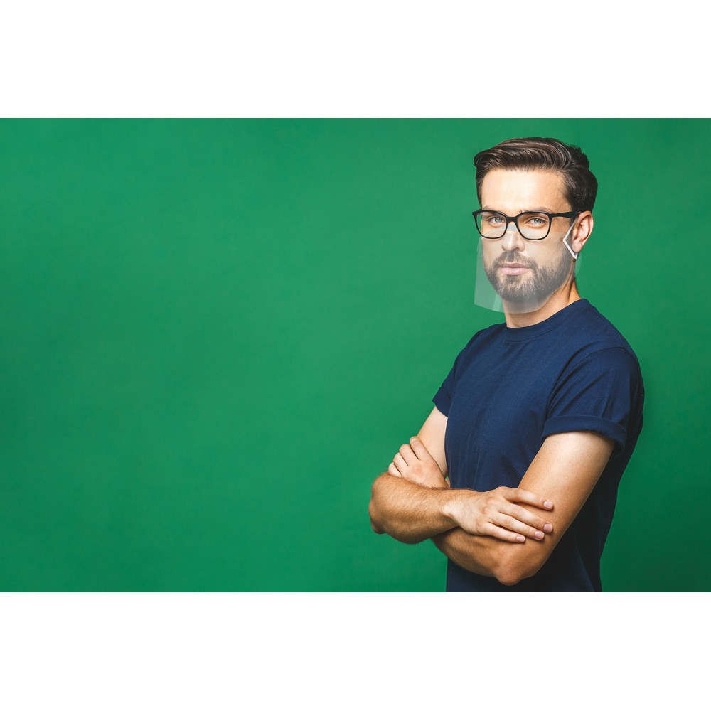 A portrait of young handsome man in casual isolated on green bac